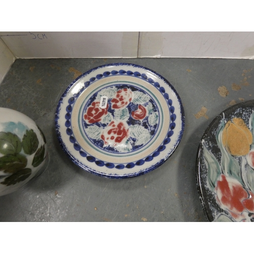 79 - Two Highland floral stoneware plates and spill vase. (3)&nbsp;