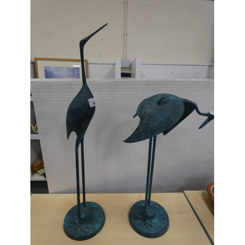 80 - Two large Indian painted metal figures of cranes.