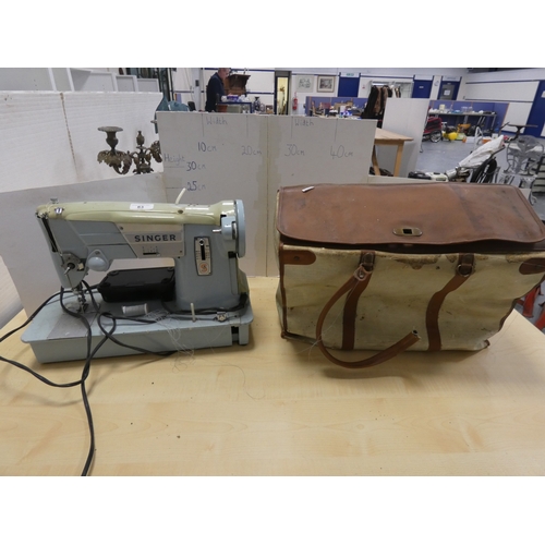 83 - Singer sewing machine.