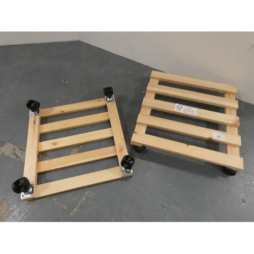 87 - Two wooden plant pot trolleys.