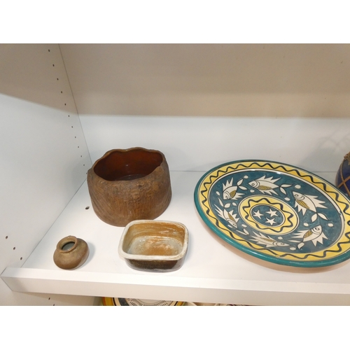 94 - Two shelves of ceramics to include two sets of six Denby dinner plates, Studio terracotta dish decor... 
