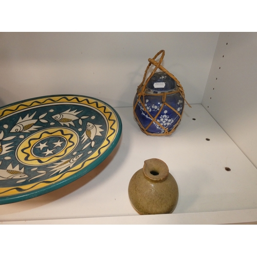 94 - Two shelves of ceramics to include two sets of six Denby dinner plates, Studio terracotta dish decor... 