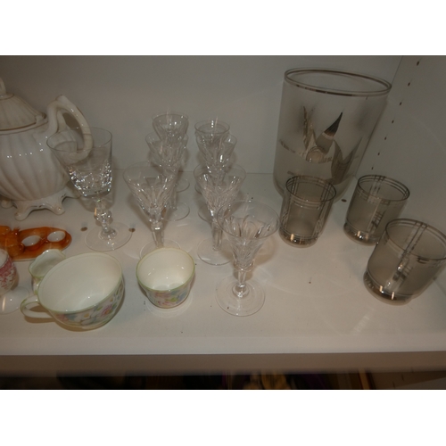 96 - Two shelves of glasses to include set of six Bristol blue coloured conical wine glasses, decanters a... 