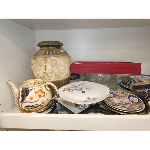 98 - Two shelves of sundries to include prints, postcards, ceramics, Westclox clock, crystal etc.