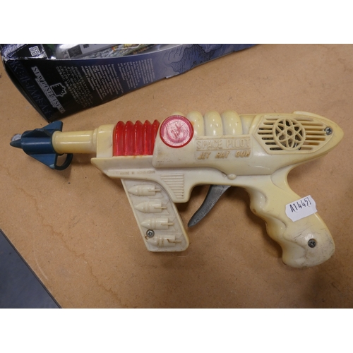 104 - Two boxes of childrens toys to include Space Pilot 