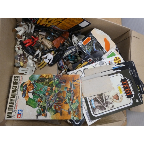 104 - Two boxes of childrens toys to include Space Pilot 