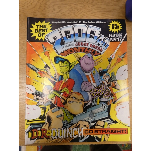 11 - Box of assorted comics to include Judge Dredd, Crisis, Revolver etc.