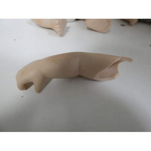 113 - Two china dolls in the form of a boy and girl, with clothing.&nbsp; (2)