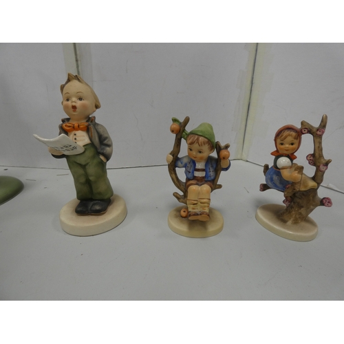 15 - Group of porcelain ornaments to include Hummel figures, bird vase, Royal Belvedere figure etc.