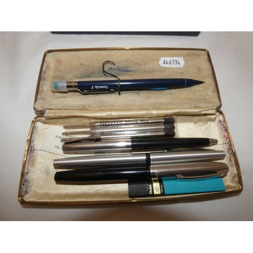 158 - Parker pen in fitted case, and other related pens and ballpoint pens.