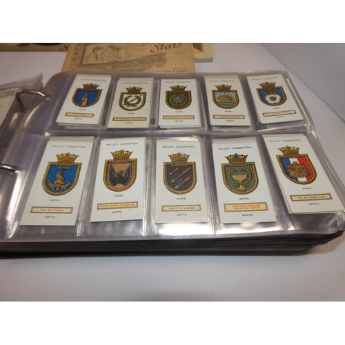159 - Folder containing cigarette cards to include railways, military, flags, maritime, world landmarks, M... 