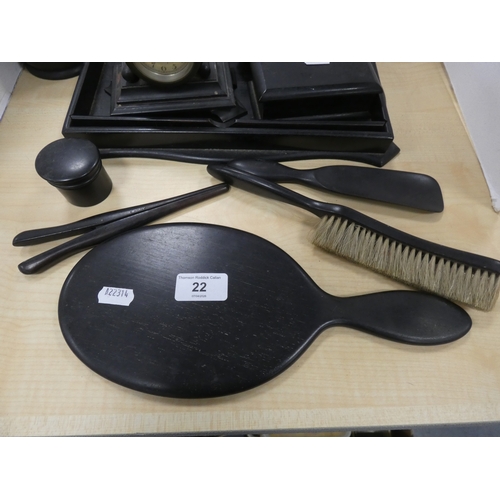 22 - Group of ebonised dressing items to include tray, mirror, box etc.