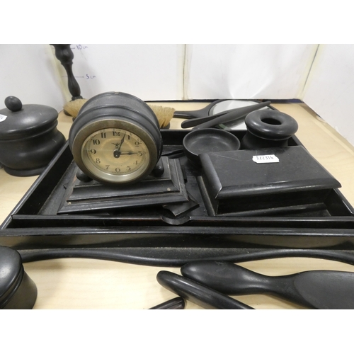 22 - Group of ebonised dressing items to include tray, mirror, box etc.