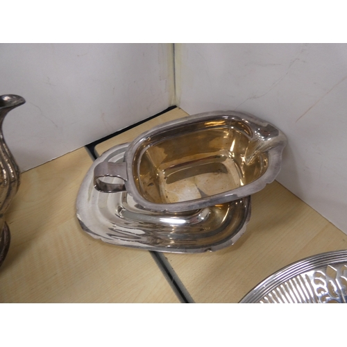 23 - Group of EP and silver plated wares to include sugar sifter, tea pot, ladle, basket, pair of mother ... 