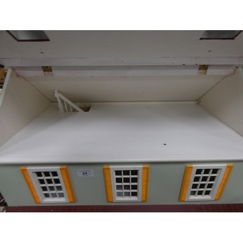 24 - Dolls house and a quantity of dolls furniture.