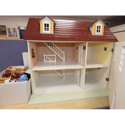 24 - Dolls house and a quantity of dolls furniture.