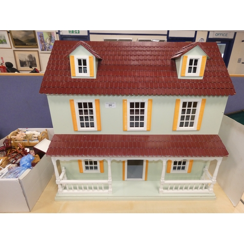 24 - Dolls house and a quantity of dolls furniture.