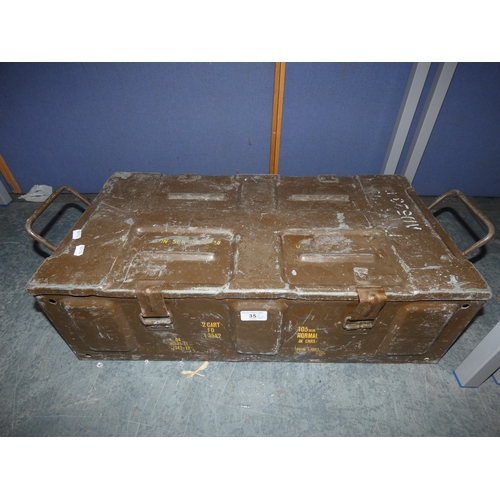 35 - Metal ammunition box containing antique price guide books, shoe lasts etc.