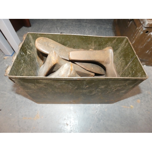 35 - Metal ammunition box containing antique price guide books, shoe lasts etc.