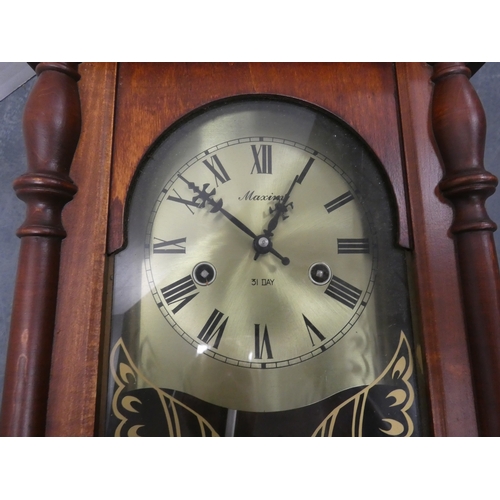 36 - Maxim wall clock.