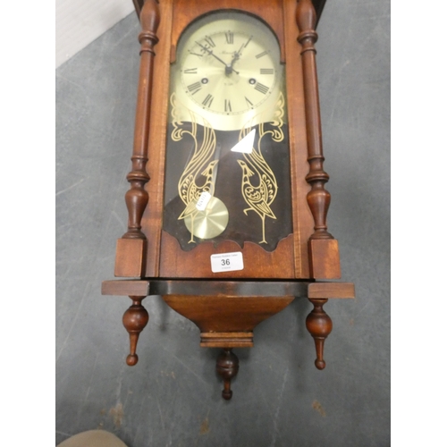 36 - Maxim wall clock.