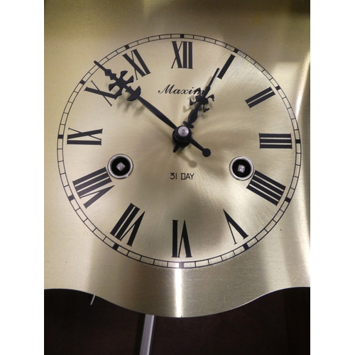 36 - Maxim wall clock.