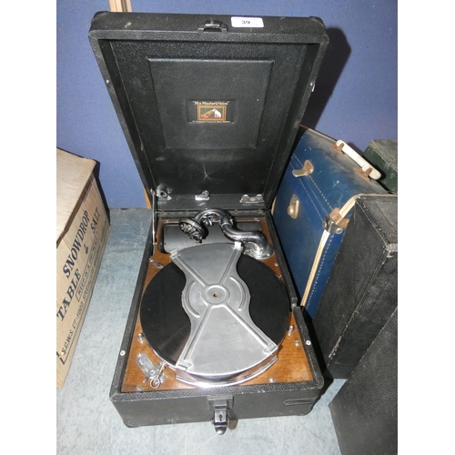 39 - HMV gramophone with a quantity of gramophone records.