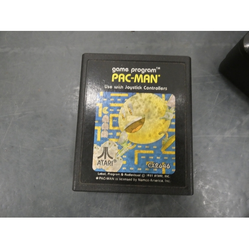 44 - Atari 2600 game console with accessories in original box.