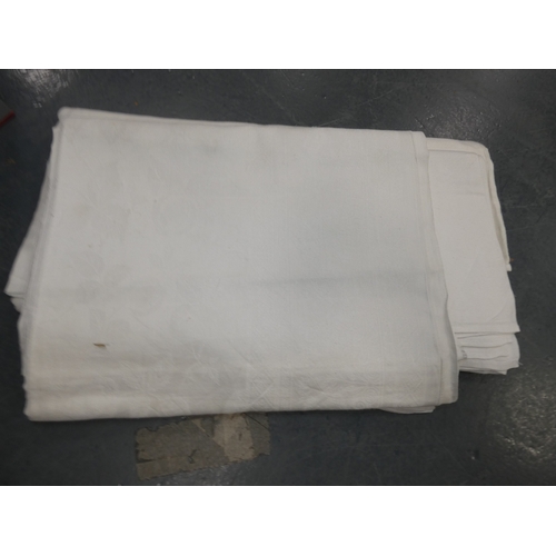 46 - Suitcase of assorted linen and napery.