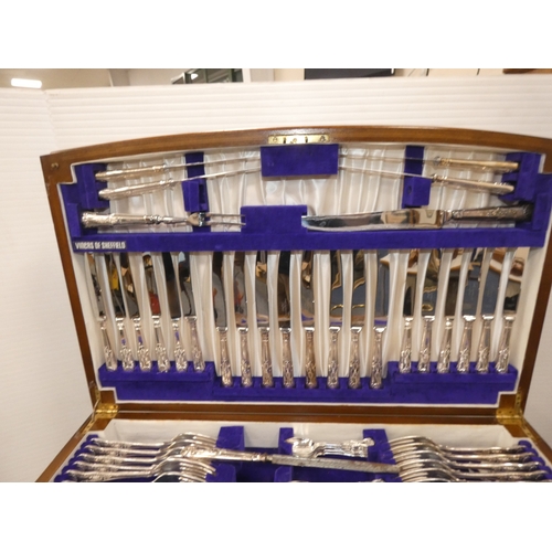 47 - Viners twelve place canteen of cutlery, contained in a walnut table.