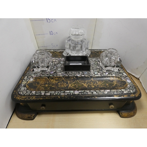 60 - Victorian ebonised and mother of pearl decorated desk stand with later glass inkwells.