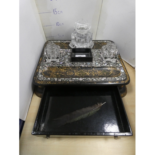 60 - Victorian ebonised and mother of pearl decorated desk stand with later glass inkwells.