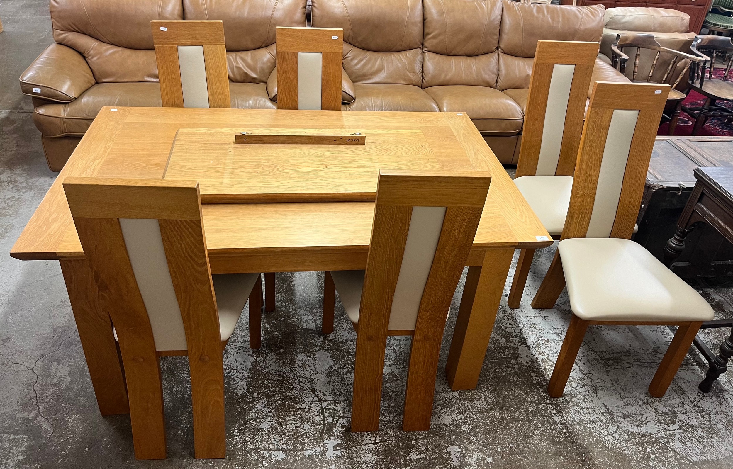 Oak dining suite comprising of table with six chairs with an extra leaf ...