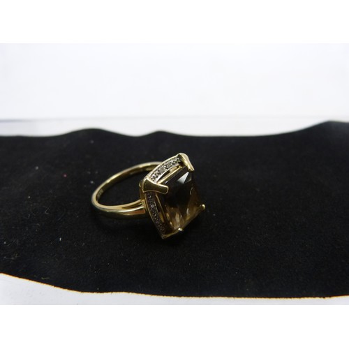 9ct gold gemset and diamond ladies ring by QVC, set with a large brown ...