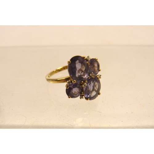 9ct gold tanzanite and diamond cluster ring by QVC, set with four ...