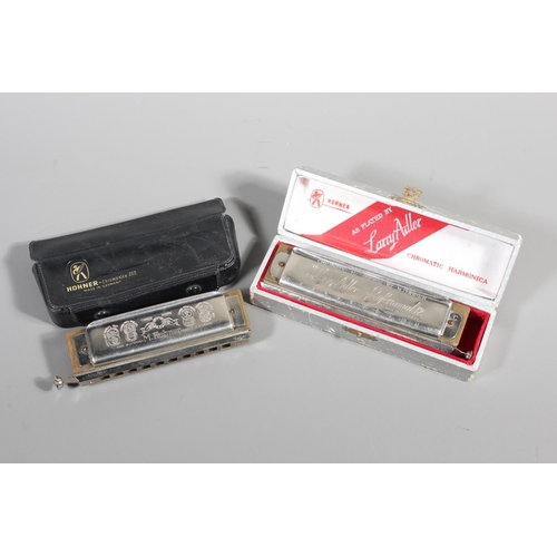 11 - Hohner The Chromonica chromatic harmonica and The Lady Adler Professional 12, boxed. (2)