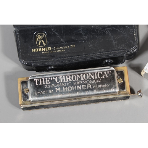 11 - Hohner The Chromonica chromatic harmonica and The Lady Adler Professional 12, boxed. (2)