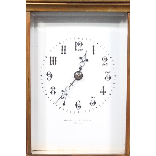 14 - French brass carriage clock retailed by Hamilton and Inches, 17cm tall.&nbsp;