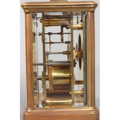 14 - French brass carriage clock retailed by Hamilton and Inches, 17cm tall.&nbsp;