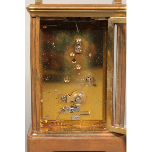 14 - French brass carriage clock retailed by Hamilton and Inches, 17cm tall.&nbsp;