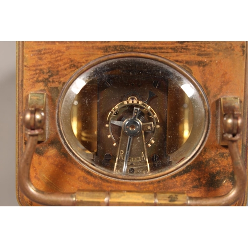 14 - French brass carriage clock retailed by Hamilton and Inches, 17cm tall.&nbsp;