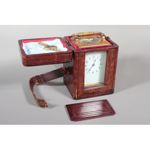 14 - French brass carriage clock retailed by Hamilton and Inches, 17cm tall.&nbsp;