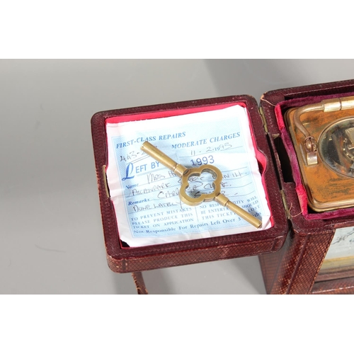 14 - French brass carriage clock retailed by Hamilton and Inches, 17cm tall.&nbsp;