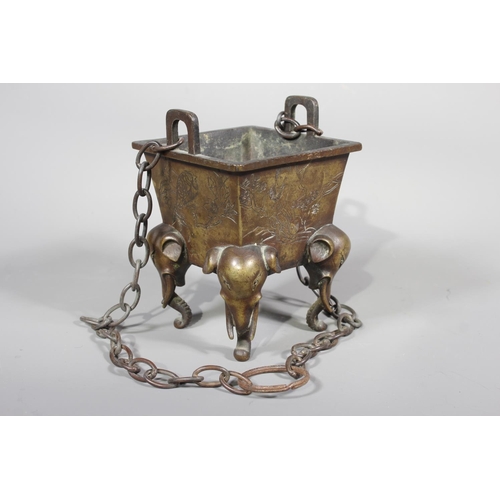 16 - Chinese bronze censer raised on four elephant supports, 14cm tall.