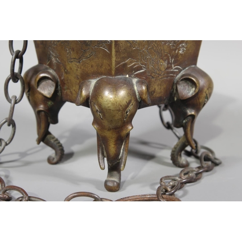 16 - Chinese bronze censer raised on four elephant supports, 14cm tall.