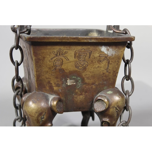 16 - Chinese bronze censer raised on four elephant supports, 14cm tall.