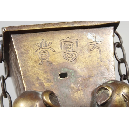 16 - Chinese bronze censer raised on four elephant supports, 14cm tall.