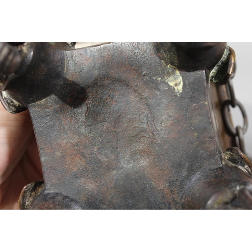 16 - Chinese bronze censer raised on four elephant supports, 14cm tall.