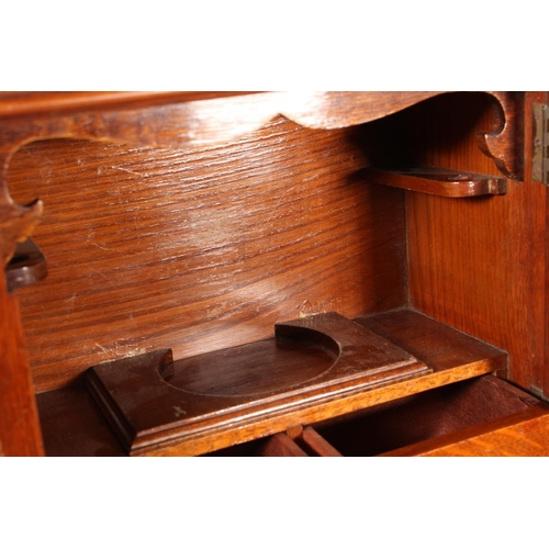 22 - Oak cased two door smokers cabinet, 33cm tall.&nbsp;