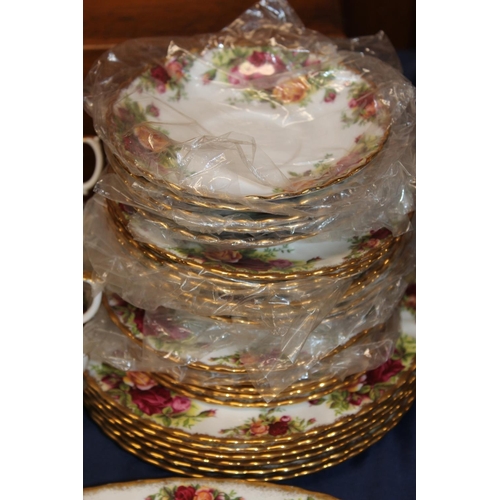 31 - Royal Albert Old Country Roses tea and dinner ware to include ashet, sauce boat, twin handled soup b... 